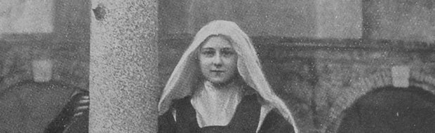 Thérèse dans ses derniers moments, accrochée à la croix